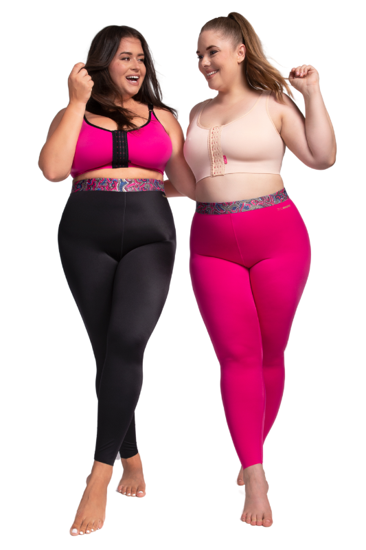 Zwei Frauen tragen die Kompressionsleggings ACTIVE leggings in Pink und Schwarz. 